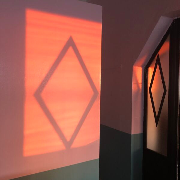 sunset projected on wall